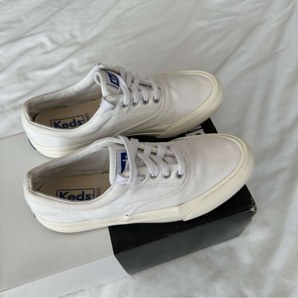 Keds Women's Champion Sneaker in white (size 5)